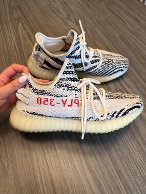 Yeezy Zebra Knit Sneakers with Red Accent